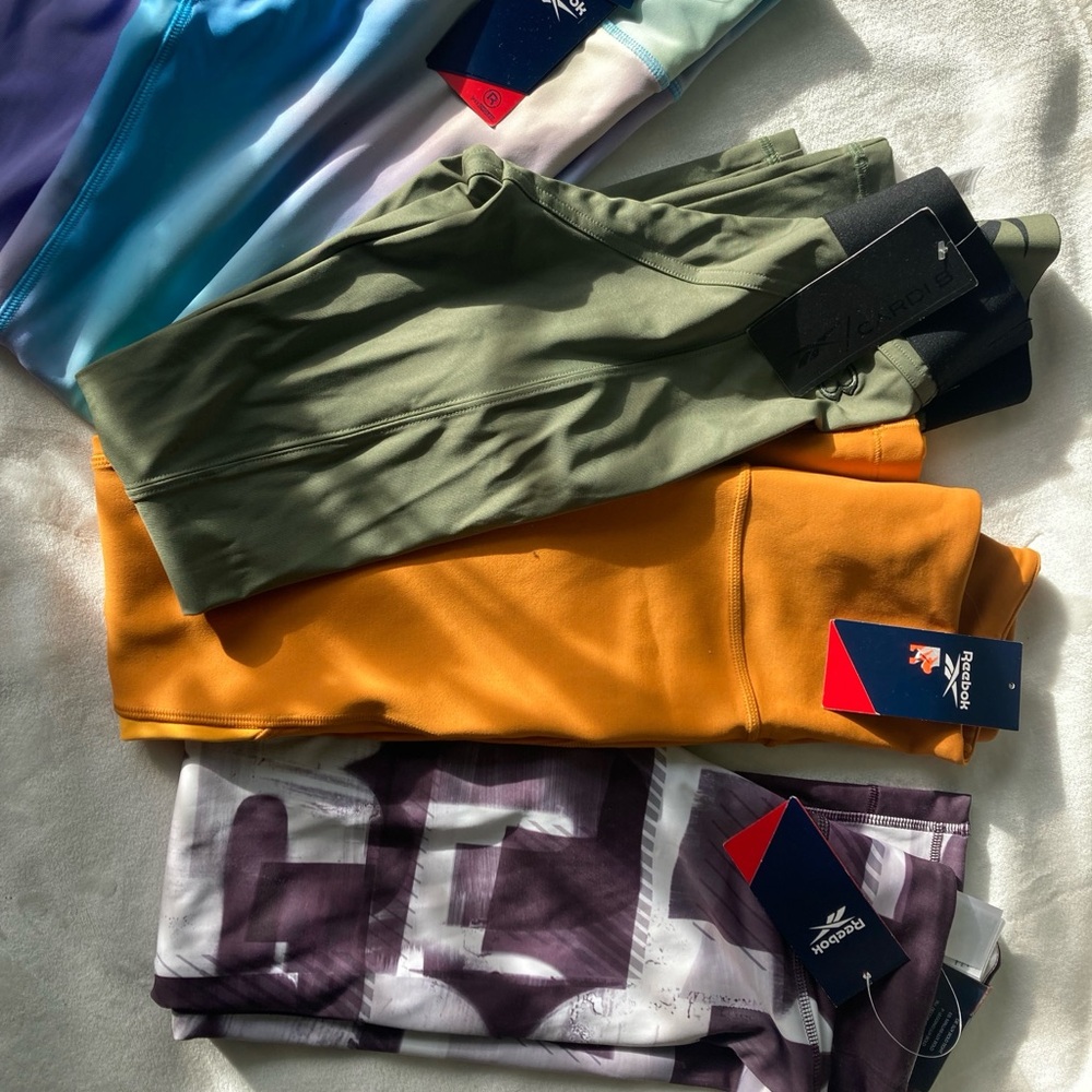Reebok women Green, Yellow, and Purple Leggings Trio 50$ each
